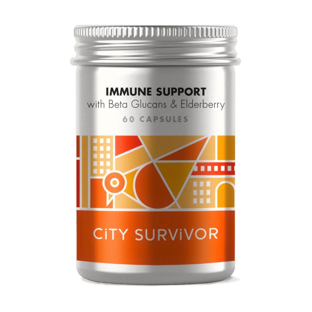 A metal screw top pot with orange abstract cityscape design featuring a pigeon logo. Label text reads City Survivor Immune Support with Beta Glucans & Elderberry- 60 capsules