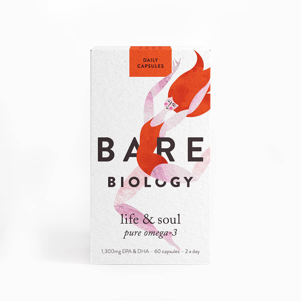 A white box with a drawing of a dancing lady with pink skin, red hair and a red leotard. Text reads Bare Biology Life & Soul Pure Omega 3 Daily capsules. 1,300mg EPA & DHA - 60 capsules - 2 a day